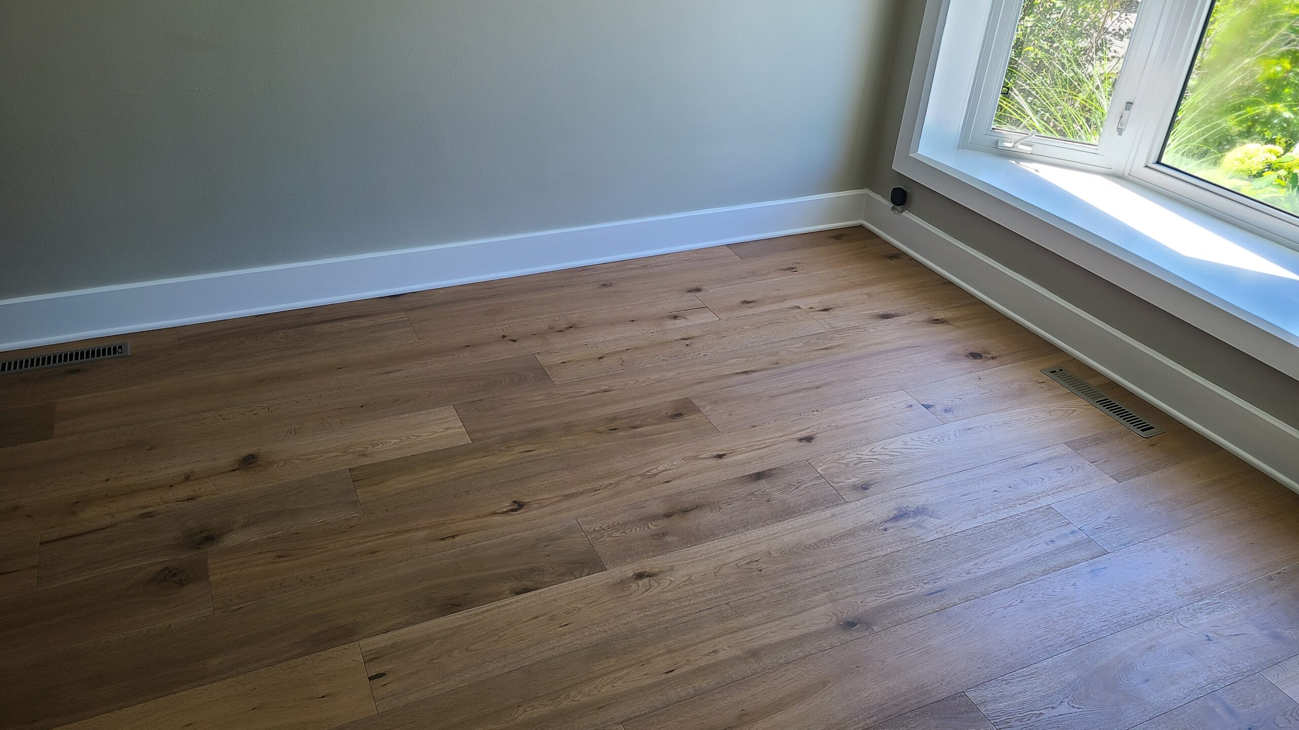 Modern home renovations in Ottawa on Larouche St featuring updated interiors, kitchen renovation, bathroom renovation, and basement renovation with exterior improvements