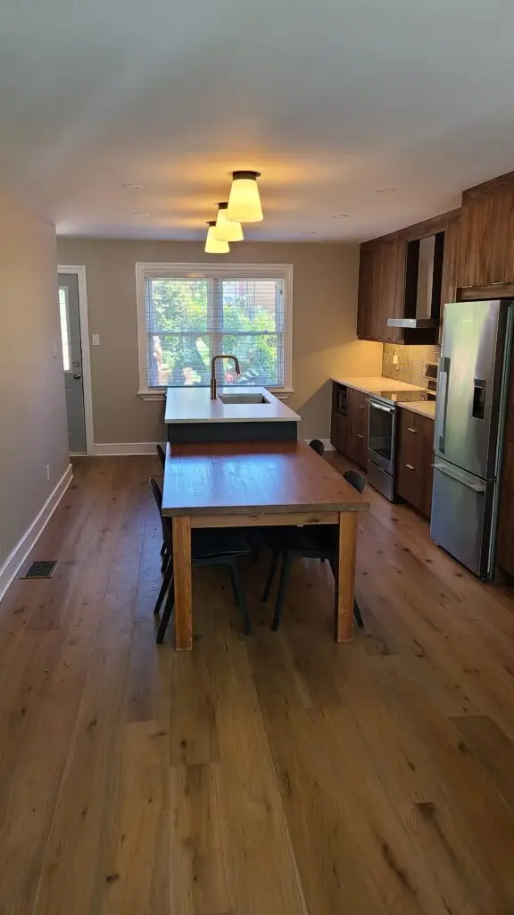 Modern home renovations in Ottawa on Larouche St featuring updated interiors, kitchen renovation, bathroom renovation, and basement renovation with exterior improvements