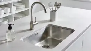 Modern kitchen with undermount sink and laminate countertop showcasing contemporary design features