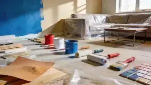 Living room renovation scene with tools and materials showcasing home improvement process